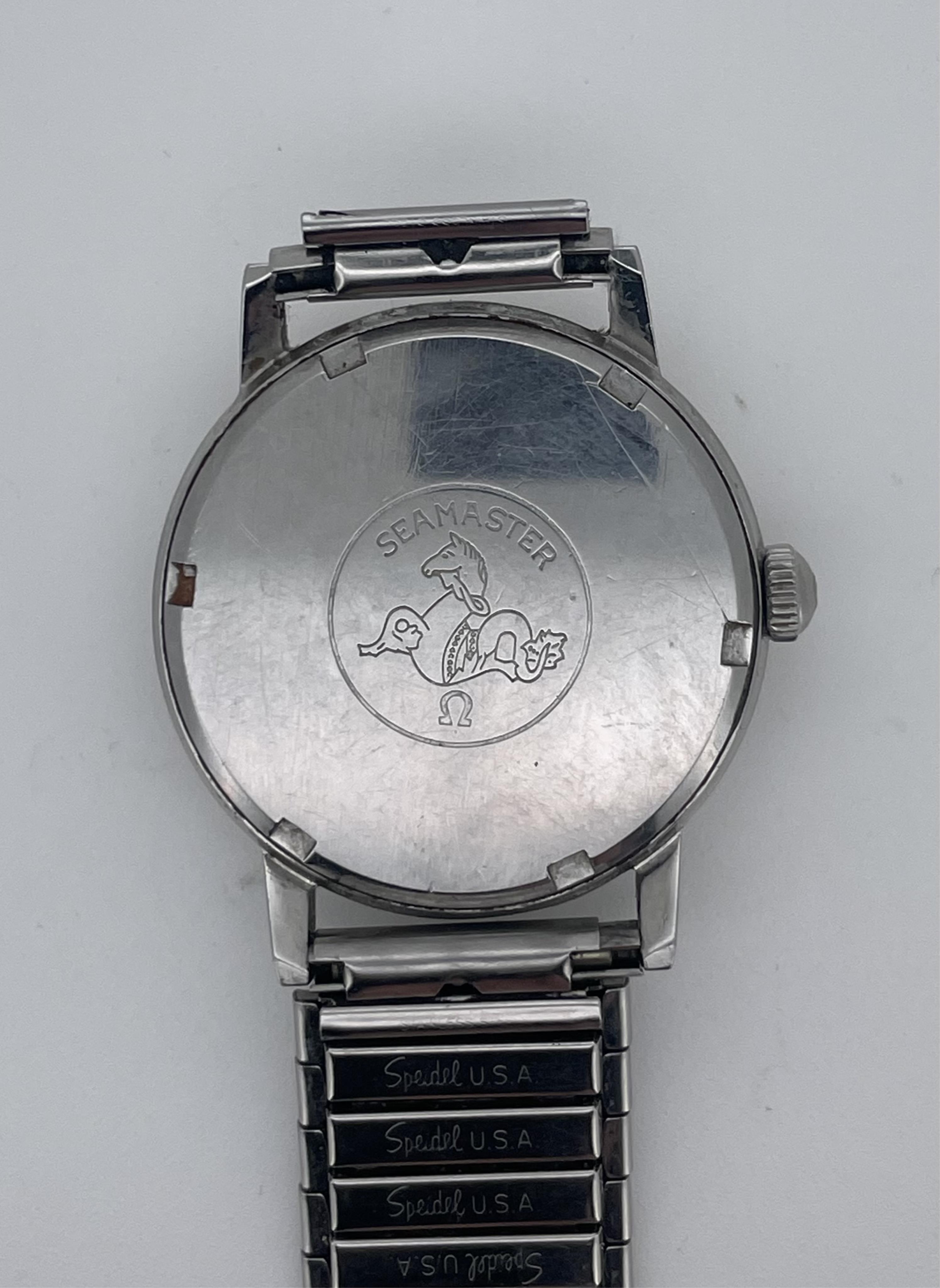 A gentleman’s Omega Seamaster 600 stainless steel automatic wristwatch, silvered engine turned dial with silver Arabic numerals, silvered pencil hands with black insert and centre sweep seconds, case diameter associated